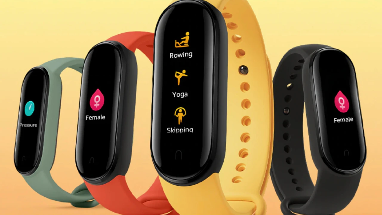 Two mint chocolate milkshakes with whipped cream and green sprinkles.